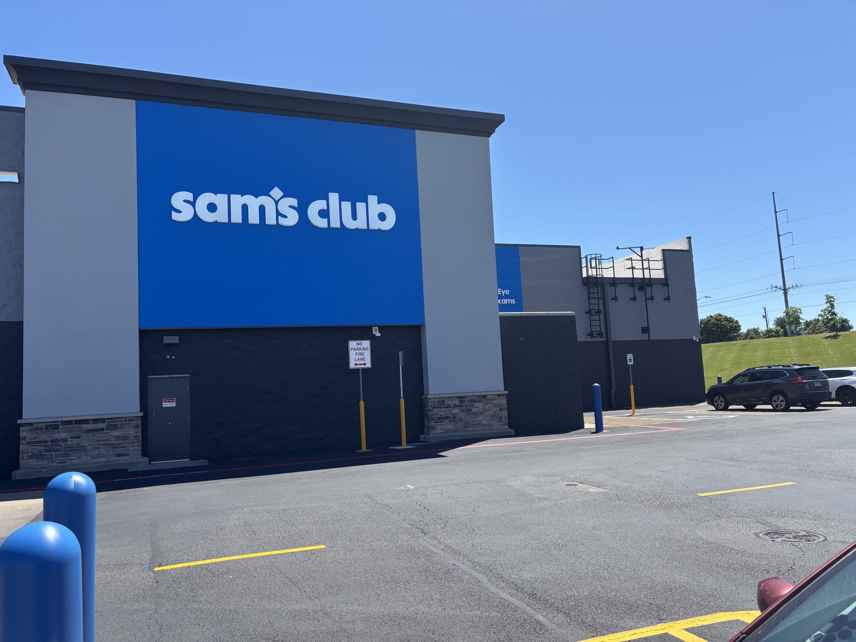 Sam's Club building with Eye Exams signage in Springdale